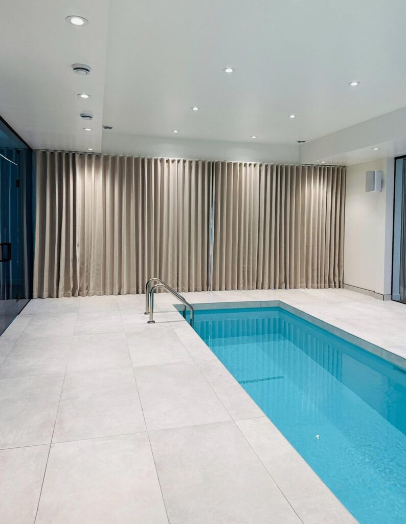 Curtains in swimming room by Skyview Blinds and Shades