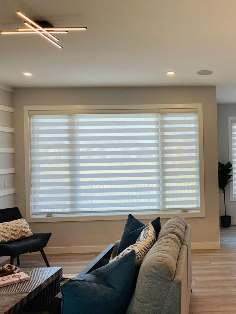 Zebra blinds in Calgary inside living room cropped vertical