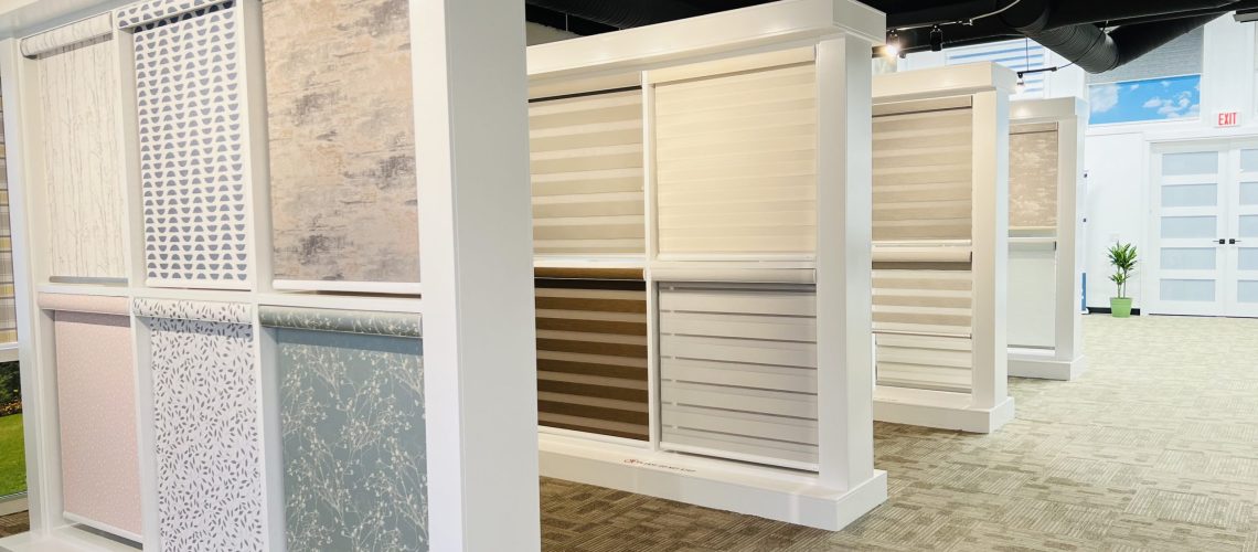 Showcasing window roller shades and blinds in Skyview Blinds & Shades Showroom in Calgary