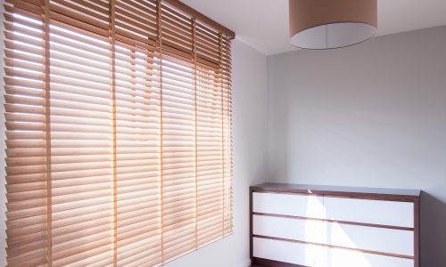 Picture of simple room interior with big blind window